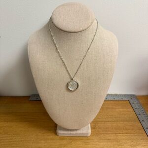 Silver tone pendant necklace with saying positive mid positive life